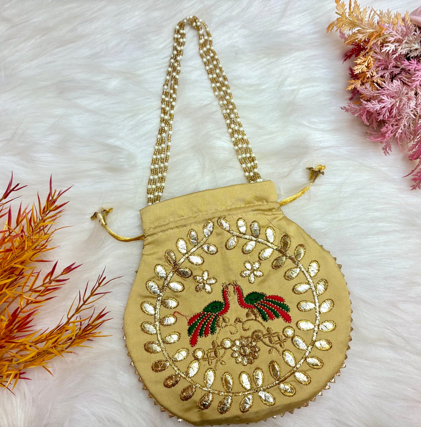 Golden beige Peacock Potli with Pearl Handle